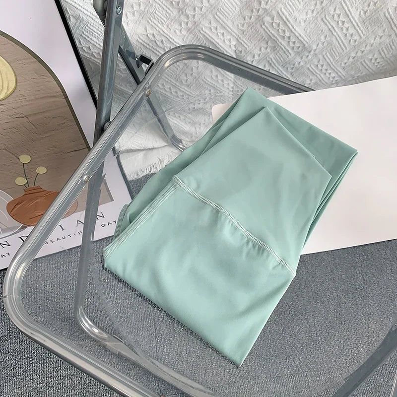 Snabbtorkande och ventilerande yogaleggings med hög midja för kvinnor