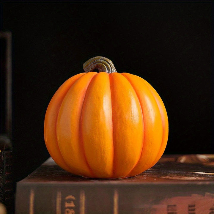 Halloweenin kaiverrettu Jack O'Lantern -koriste pääkallokuvioinnilla, hartsia