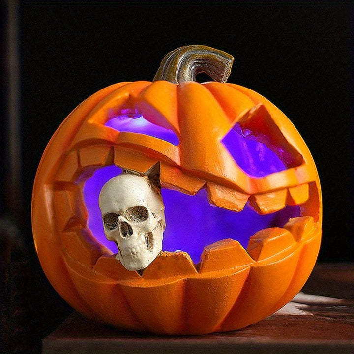 Halloweenin kaiverrettu Jack O'Lantern -koriste pääkallokuvioinnilla, hartsia