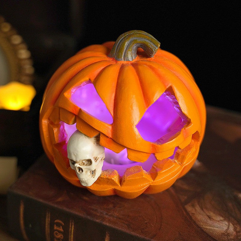 Halloweenin kaiverrettu Jack O'Lantern -koriste pääkallokuvioinnilla, hartsia