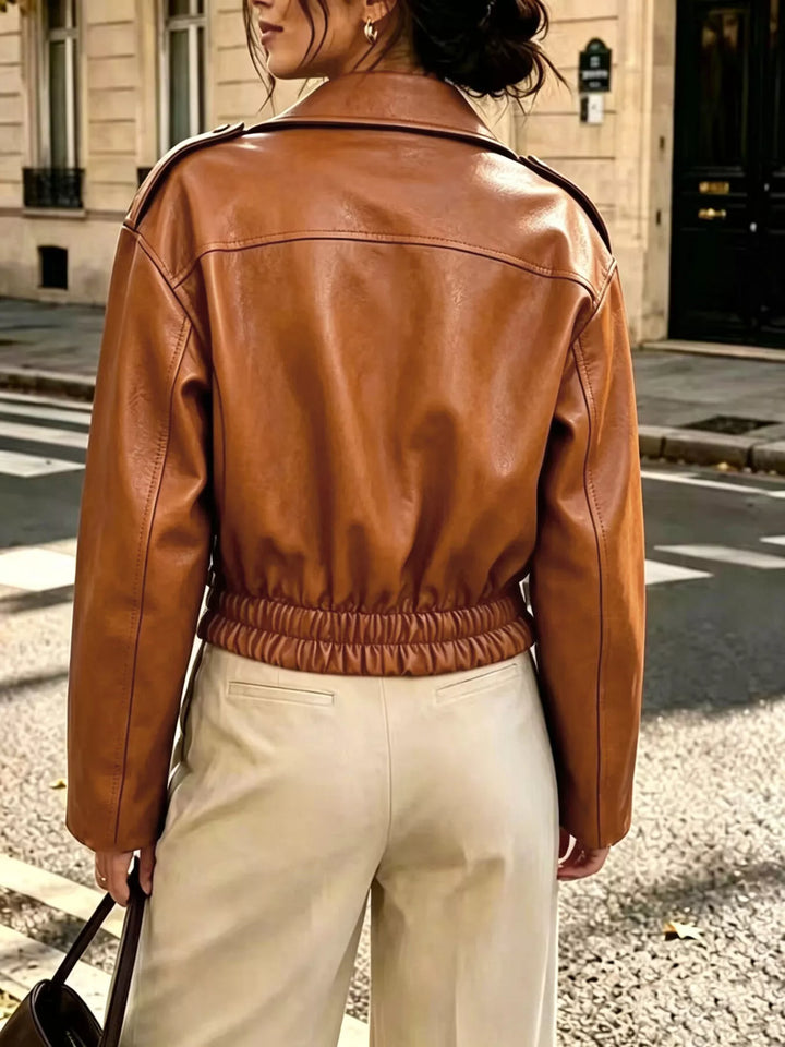 Dámská bunda z umělé kůže s řasenými detaily a zapínáním na zip, velikosti S-XXL