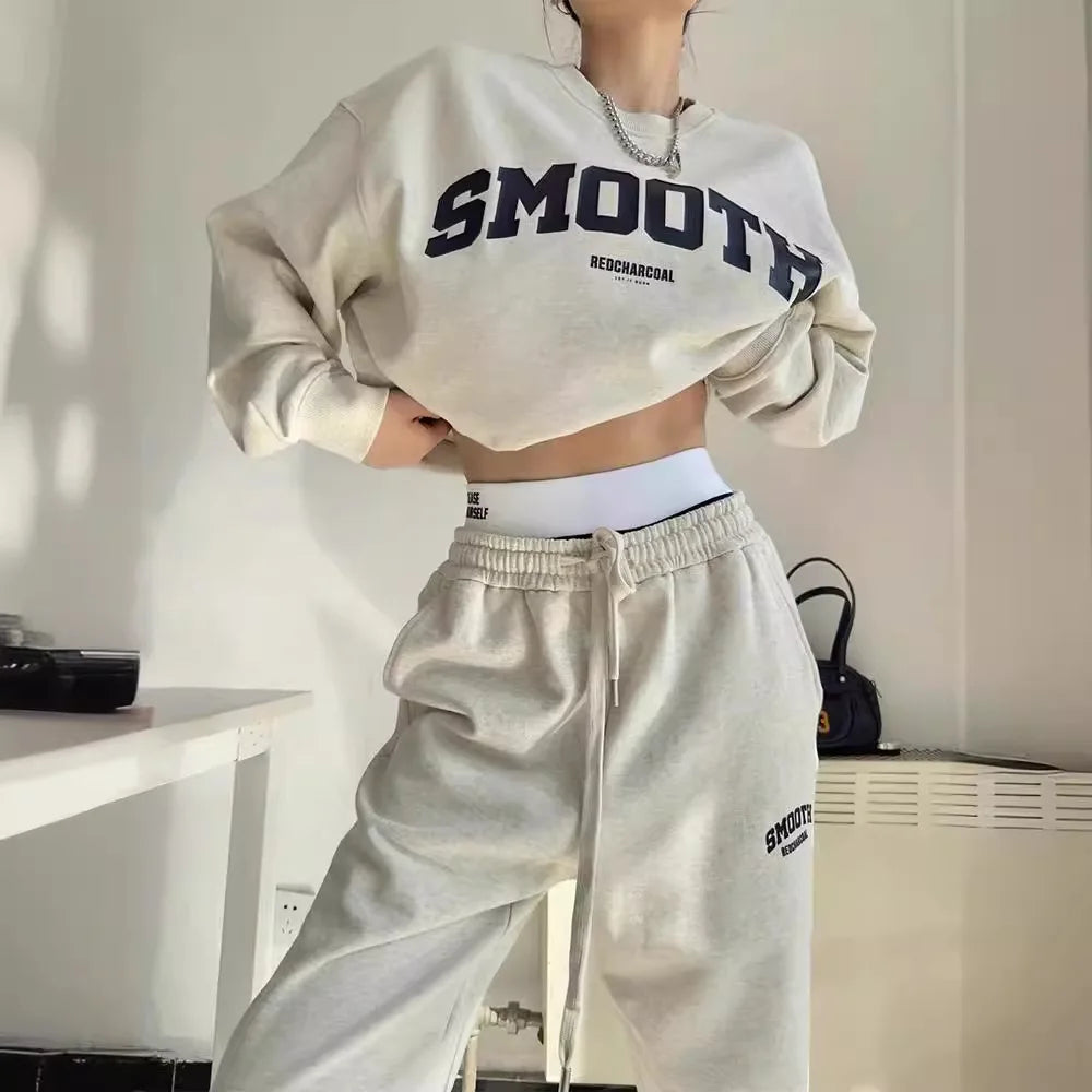 Komfortabel joggedress for menn med oversized genser og joggebukser