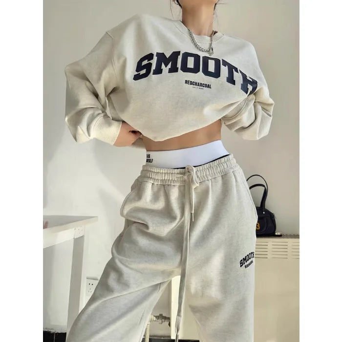 Komfortabel joggedress for menn med oversized genser og joggebukser