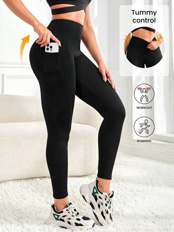 Enfärgade yogaleggings med hög midja och fickor för kvinnor