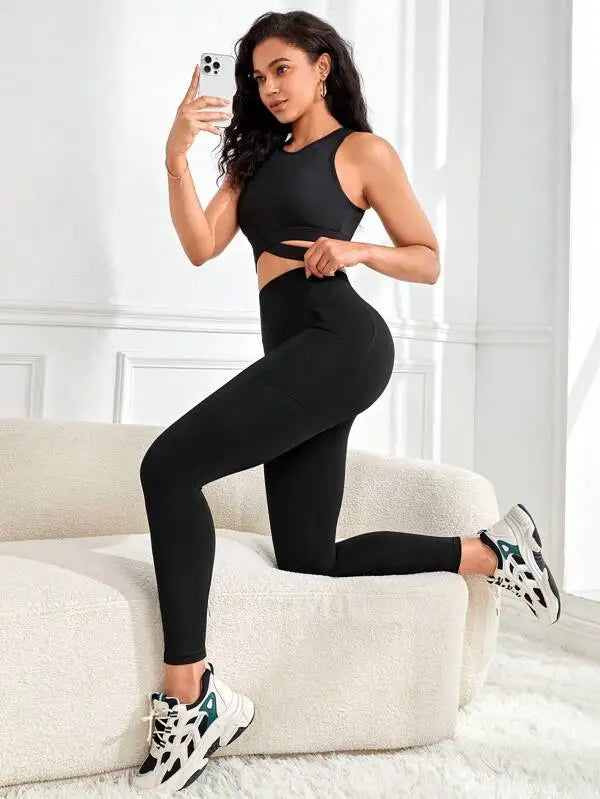Enfärgade yogaleggings med hög midja och fickor för kvinnor