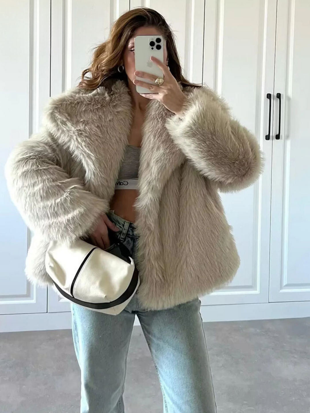Cappotto elegante da donna avvolgente con revers a lancia