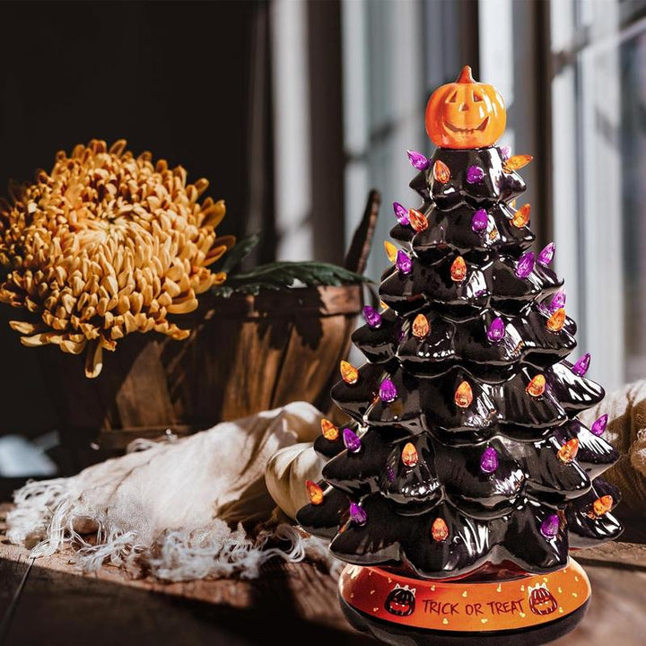 Halloweens keramiske LED-juledekorasjonstre med lilla og oransje perler