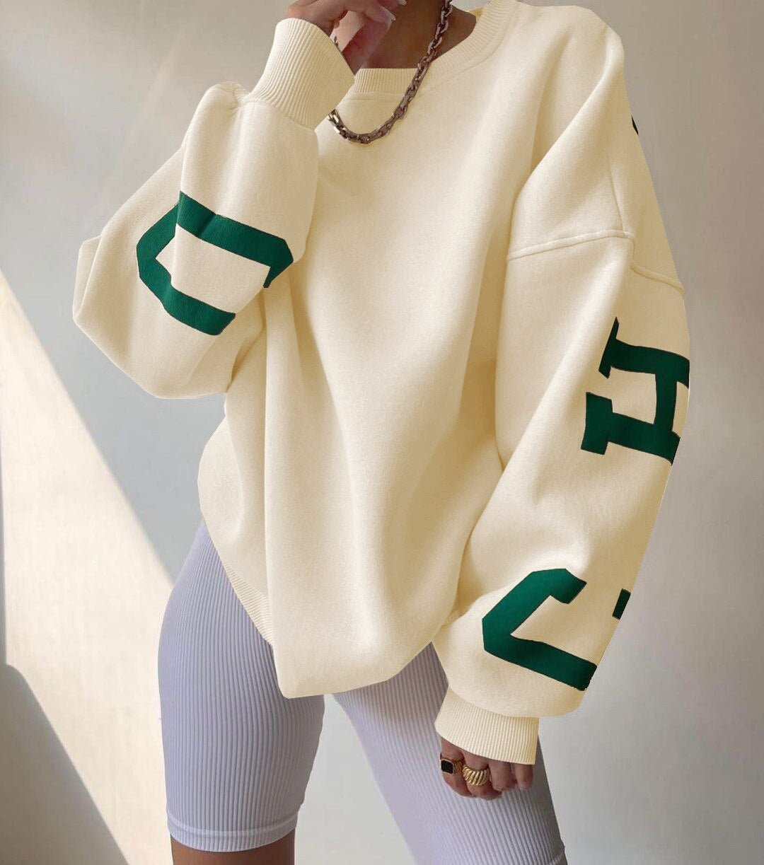 Women's Oversized Fleece Crewneck Sweater with Varsity Sleeves