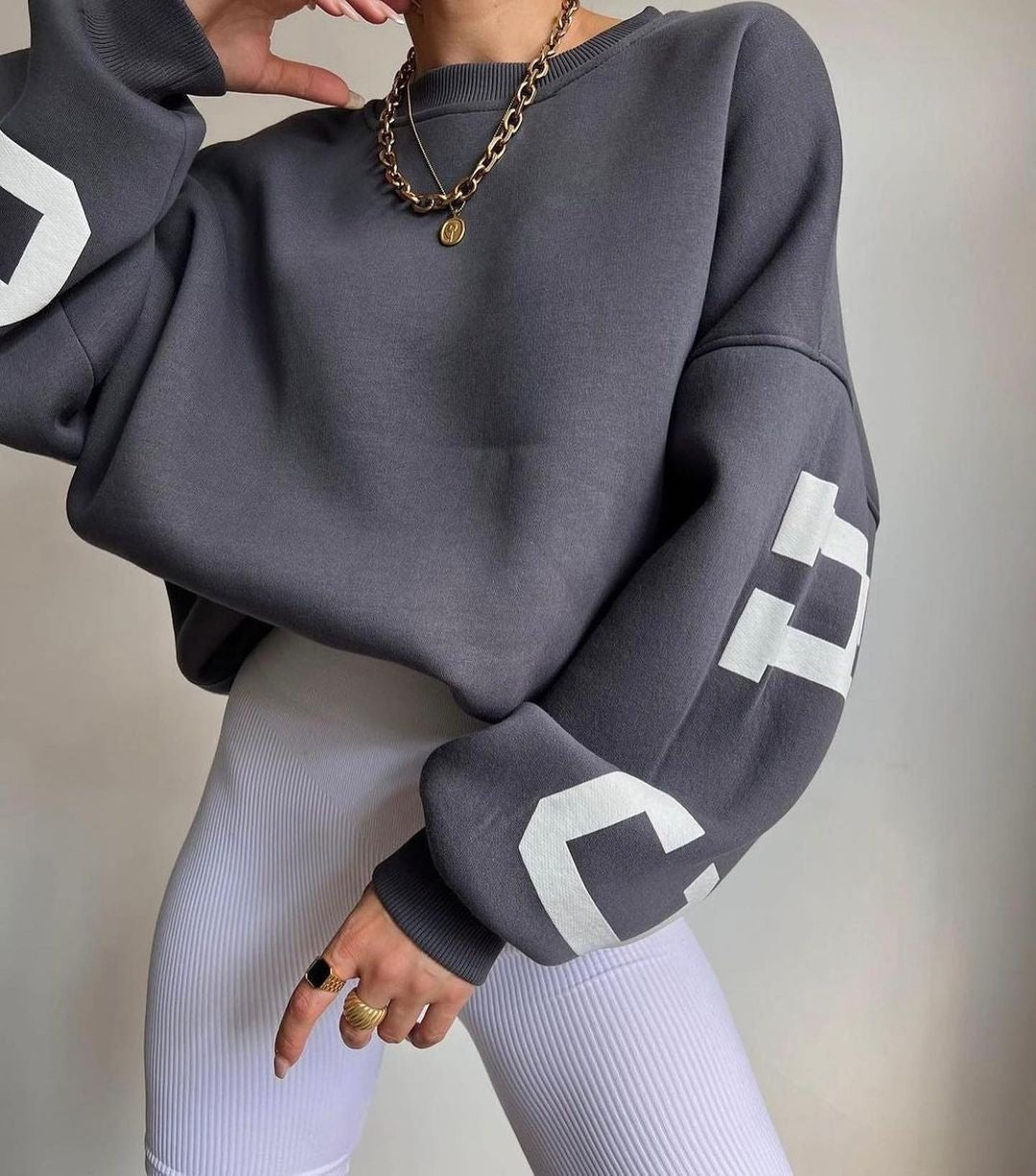 Women's Oversized Fleece Crewneck Sweater with Varsity Sleeves