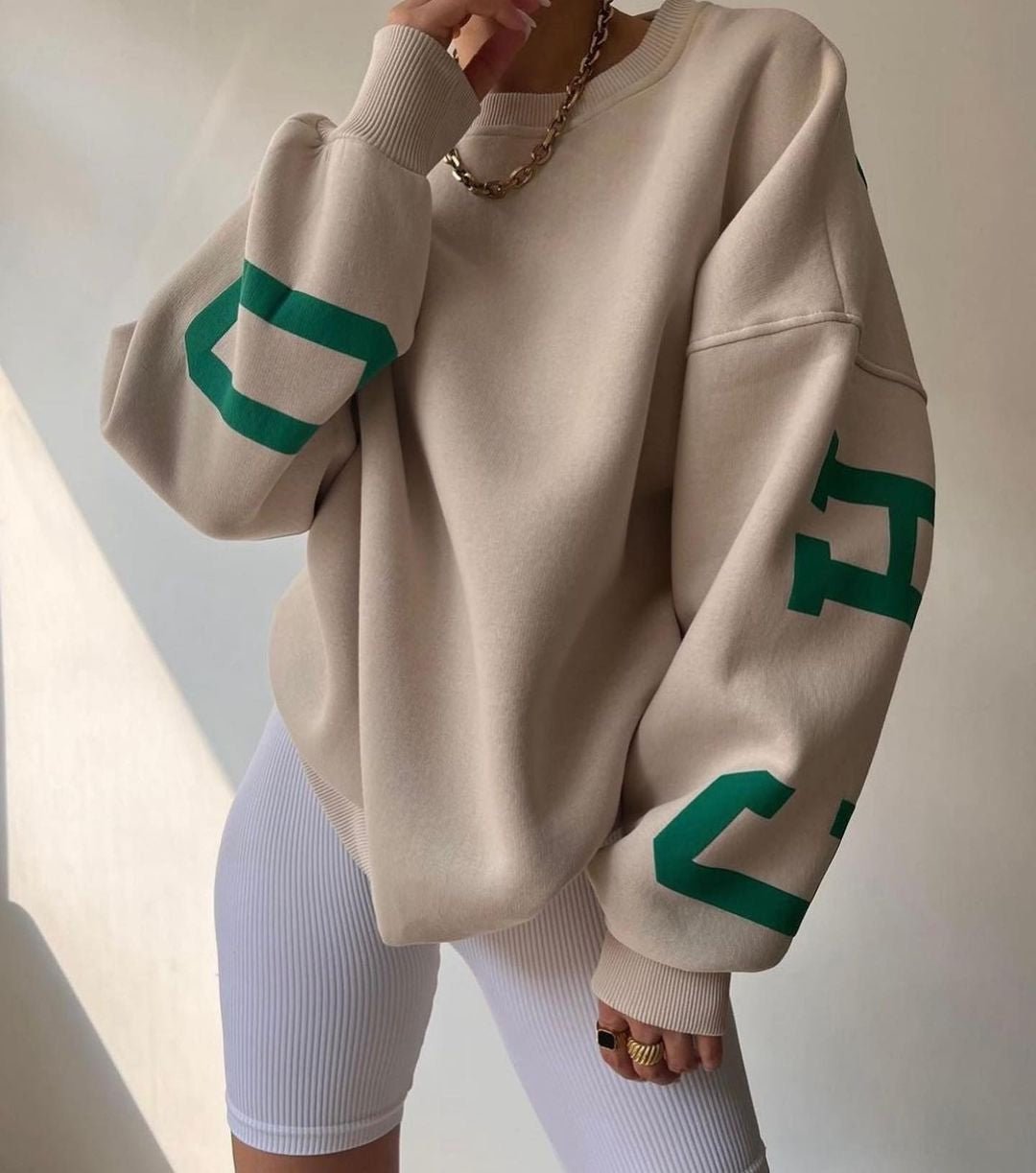 Women's Oversized Fleece Crewneck Sweater with Varsity Sleeves